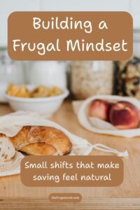 Vertical pin with the text "Building a Frugal Mindset" and a calm, simple design